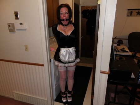 Angelmaid Forgotten - We had a party the night previous with some vanilla friends. Some of masters lady friends were interested in our lifestyle so I gave them a taste of what my day would consist of. I put on my angelmaid outfit and then master locked on my armbinder and large ring gag. When I came out of the bedroom the look on these ladies faces was complete shock!!! I though one of them was going to ********!!! Anyway they all were very intrigued by what they saw, the questions and all of them trying on some of my gear went on well into the next morning. After our friends had left we all were a bit ***** so master and I continued to play. Master chained me up in the laundry room and then went to bed!!!! Master left me ring gagged, arm bound, and standing in 6 inch stilettos all day!!!!!