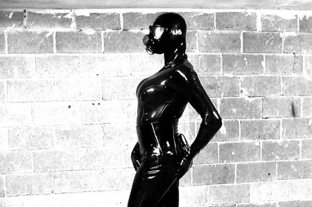 Time To Shine - Susan avalon shines up her hot latex covered body with thigh highs and gasmask !